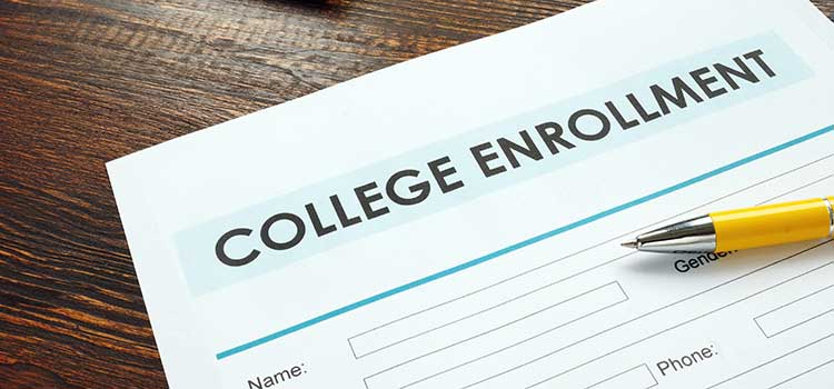 college enrollment form and pen