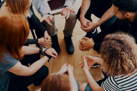 juvenile justice officer meeting with group of juveniles