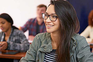 student sitting in classroom