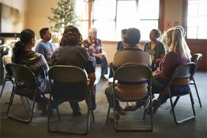 community gathering to discuss justice for neighborhood crimes