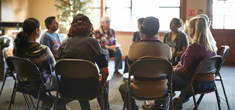community gathering to discuss justice for neighborhood crimes